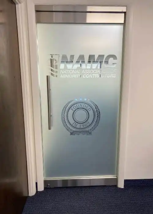 NAMC logo in decorative film